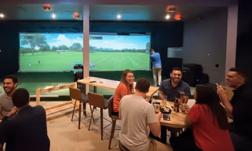 Friends enjoying a private event at Apex Golf Club